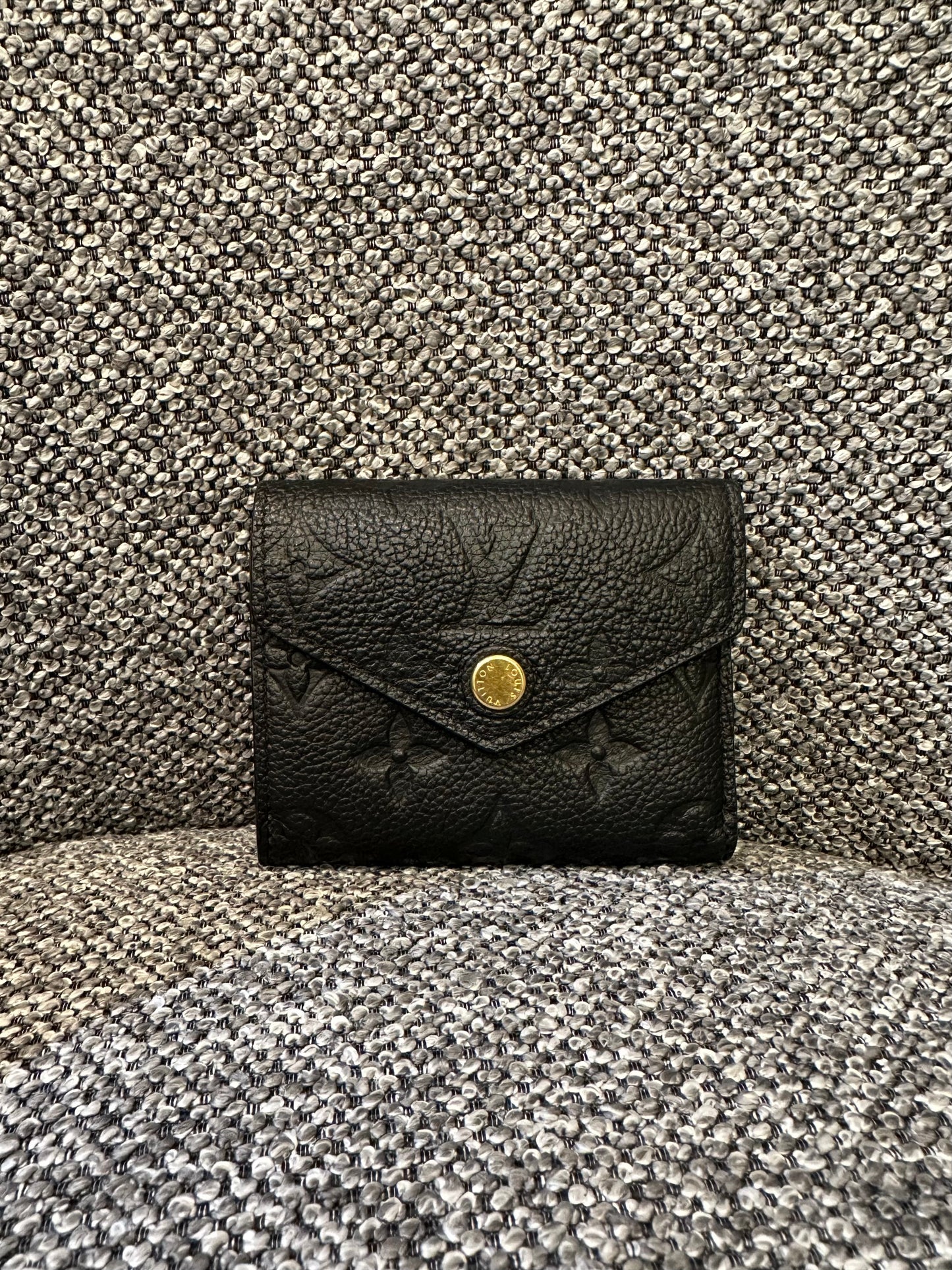 Louis Vuitton Zoe Wallet In Black Embossed Empreinte Leather