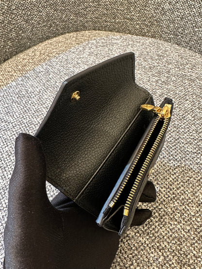 Louis Vuitton Zoe Wallet In Black Embossed Empreinte Leather