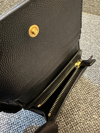 Yves Saint Laurent Cassandre Matelasse Wallet In Black Leather