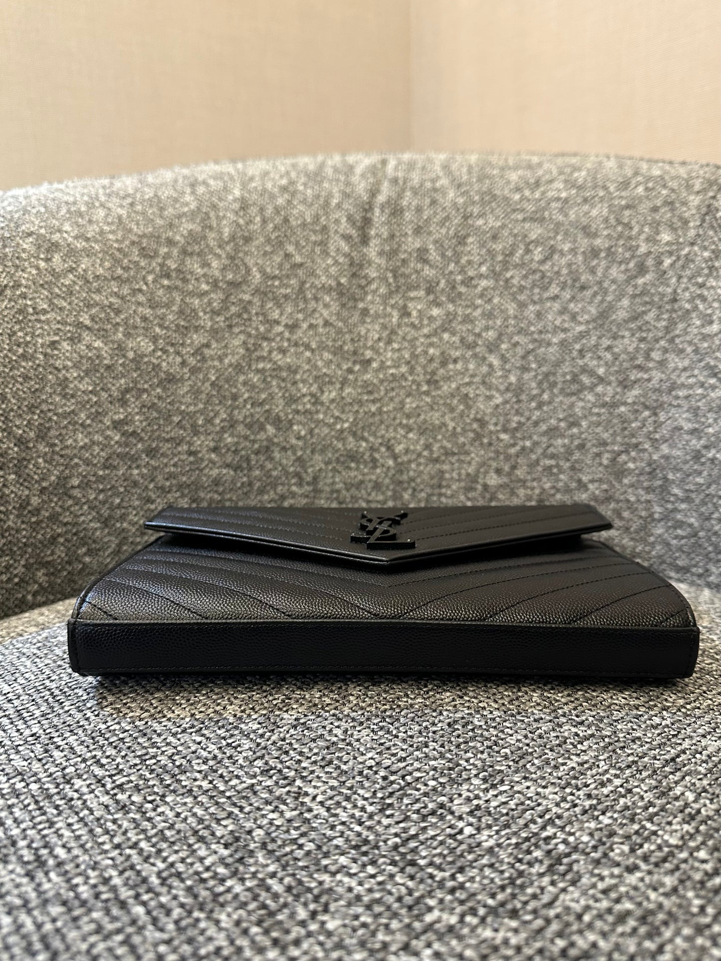 Yves Saint Laurent Cassandre Envelope Chain Wallet In Black Grain De Poudre Embossed Leather