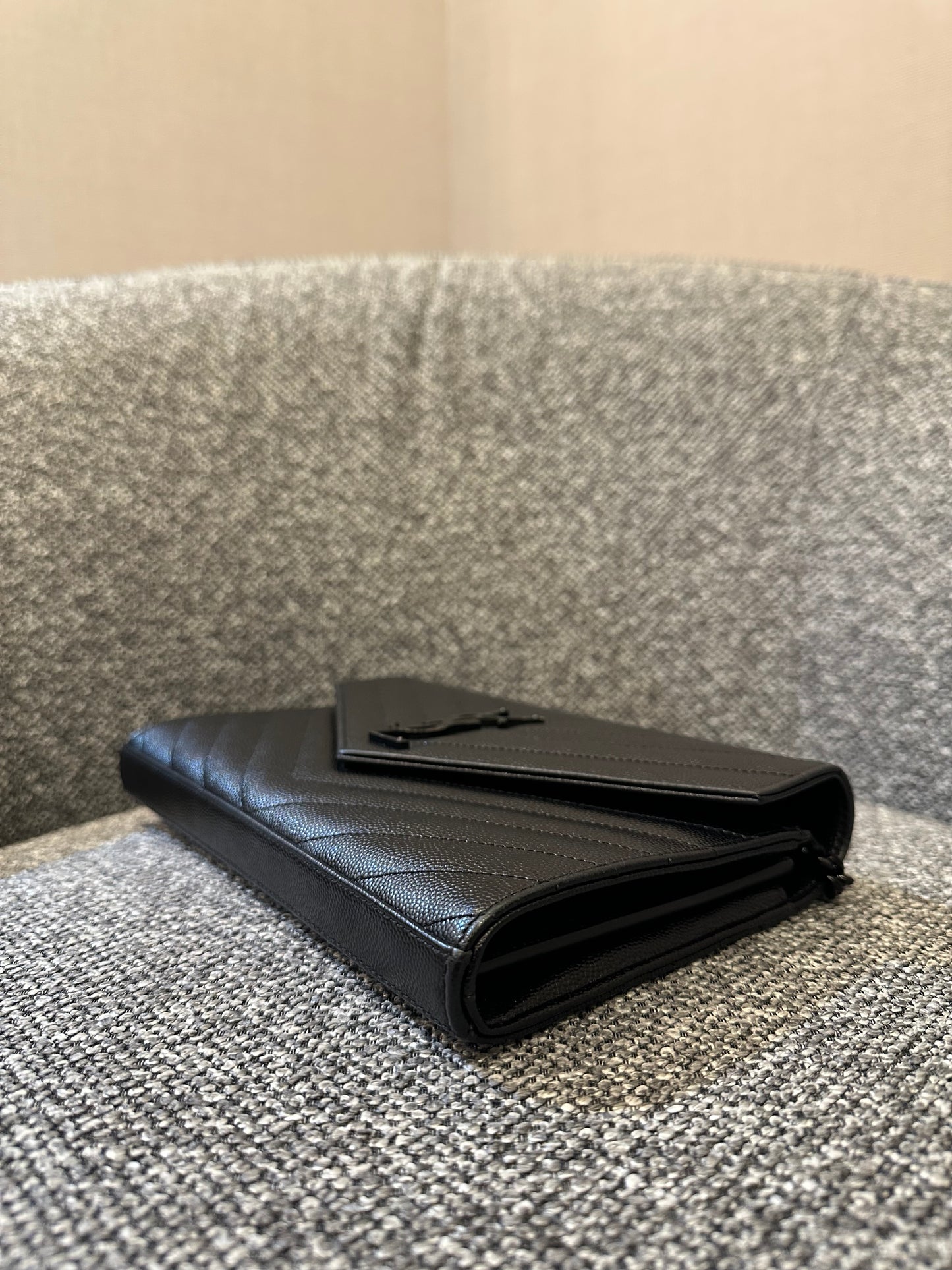 Yves Saint Laurent Cassandre Envelope Chain Wallet In Black Grain De Poudre Embossed Leather