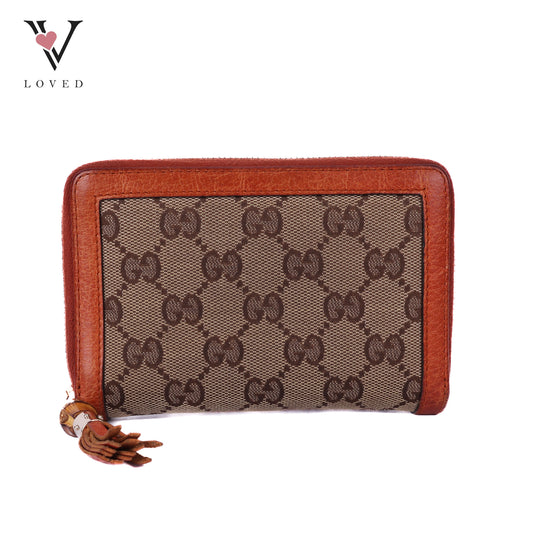 Monogram Bamboo Tassel Zip Around Wallet