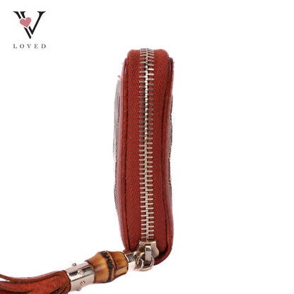 Monogram Bamboo Tassel Zip Around Wallet