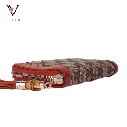 Monogram Bamboo Tassel Zip Around Wallet