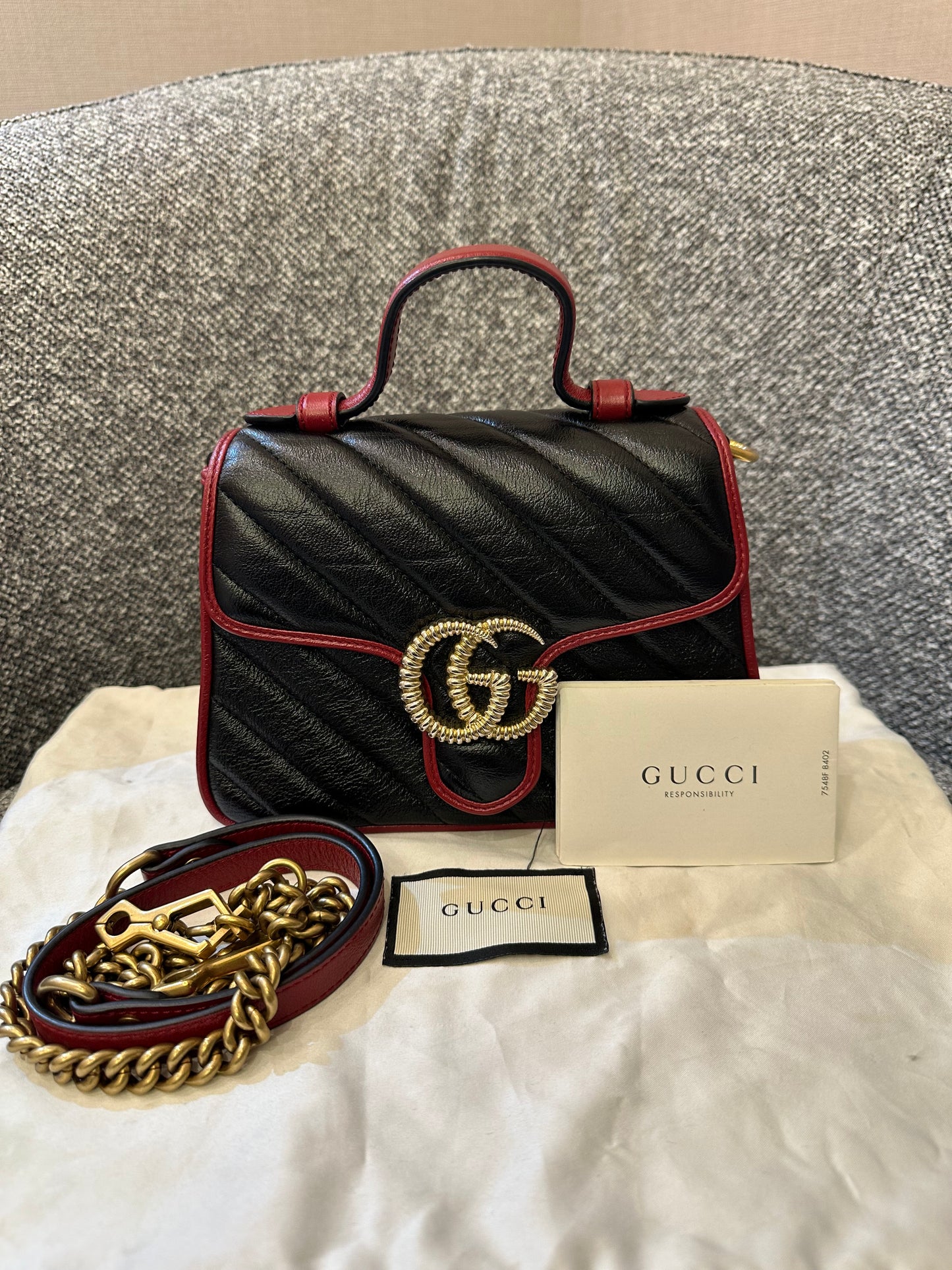 Gucci GG Marmont Flap Handbag In Black Quilted Chevron Leather