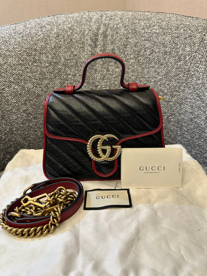 Gucci GG Marmont Flap Handbag In Black Quilted Chevron Leather
