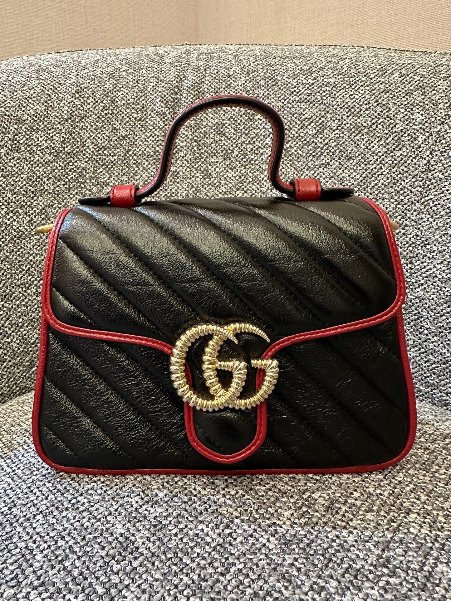 Gucci GG Marmont Flap Handbag In Black Quilted Chevron Leather