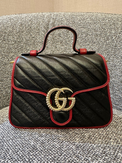 Gucci GG Marmont Flap Handbag In Black Quilted Chevron Leather