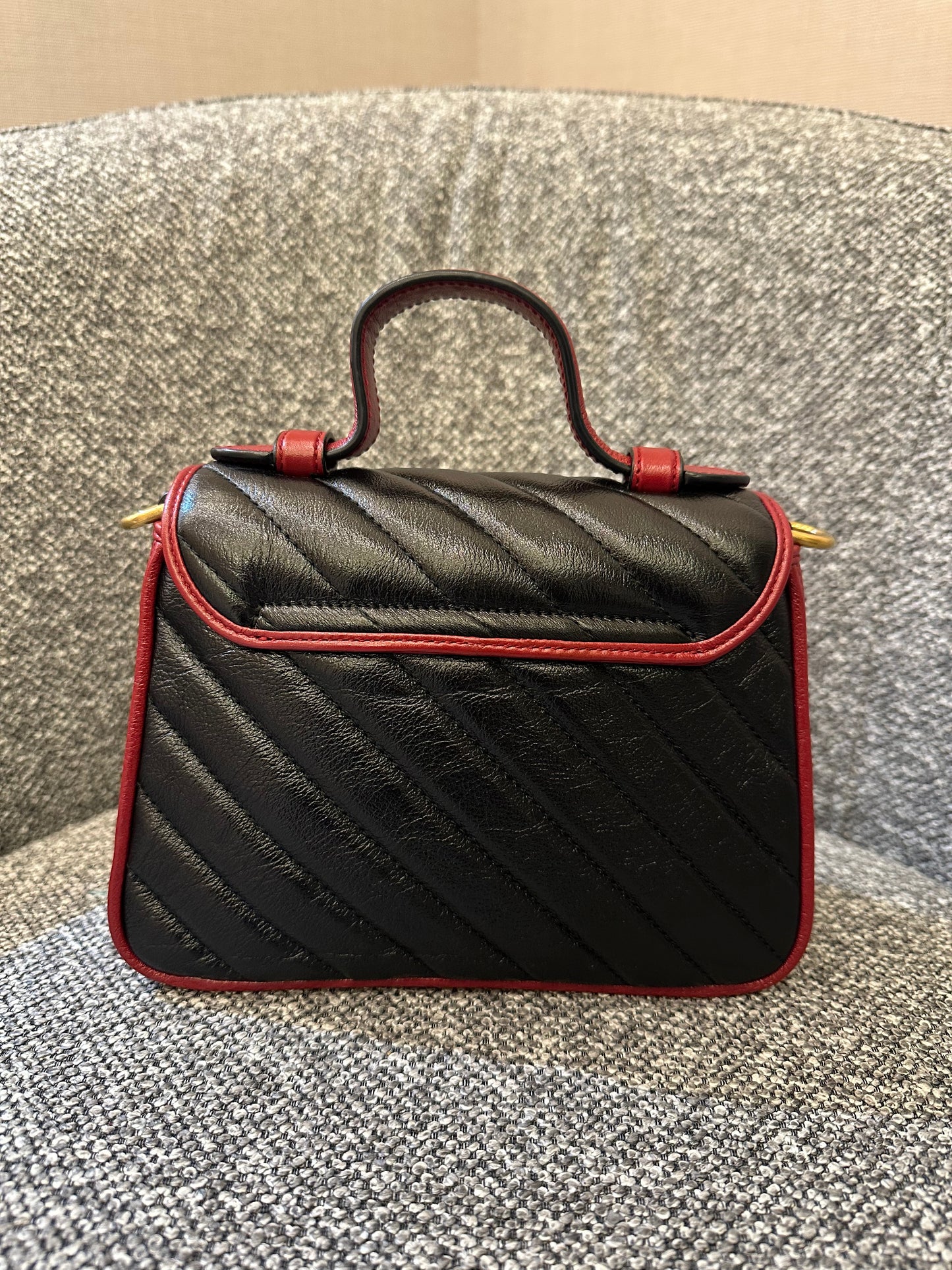Gucci GG Marmont Flap Handbag In Black Quilted Chevron Leather