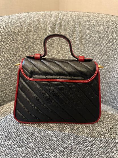 Gucci GG Marmont Flap Handbag In Black Quilted Chevron Leather