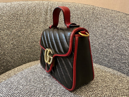 Gucci GG Marmont Flap Handbag In Black Quilted Chevron Leather