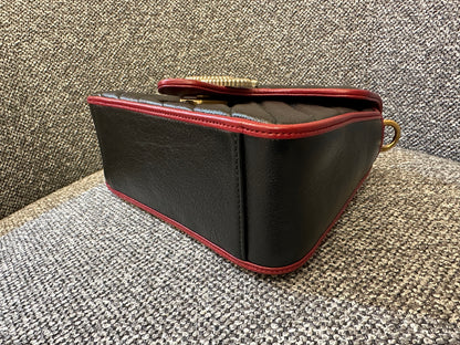 Gucci GG Marmont Flap Handbag In Black Quilted Chevron Leather