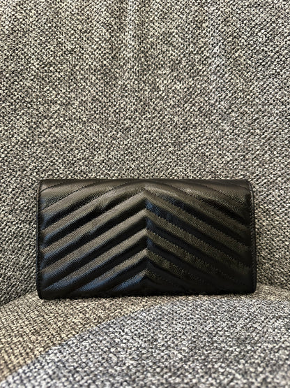 Yves Saint Laurent Cassandre Matelassé Wallet in Black Leather