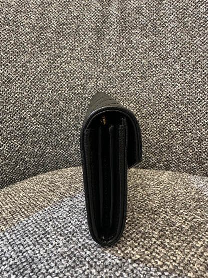 Yves Saint Laurent Cassandre Matelassé Wallet in Black Leather