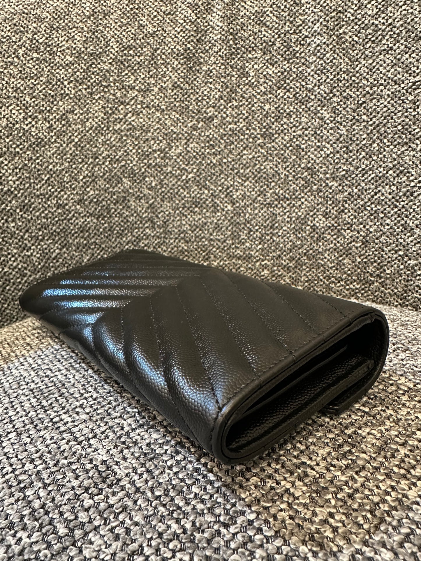 Yves Saint Laurent Cassandre Matelassé Wallet in Black Leather