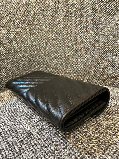 Yves Saint Laurent Cassandre Matelassé Wallet in Black Leather