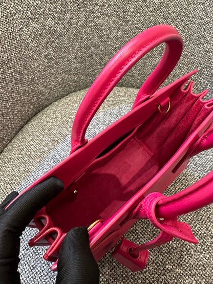 Yves Saint Laurent Sac de Jour Handbag in Fushcia Pink