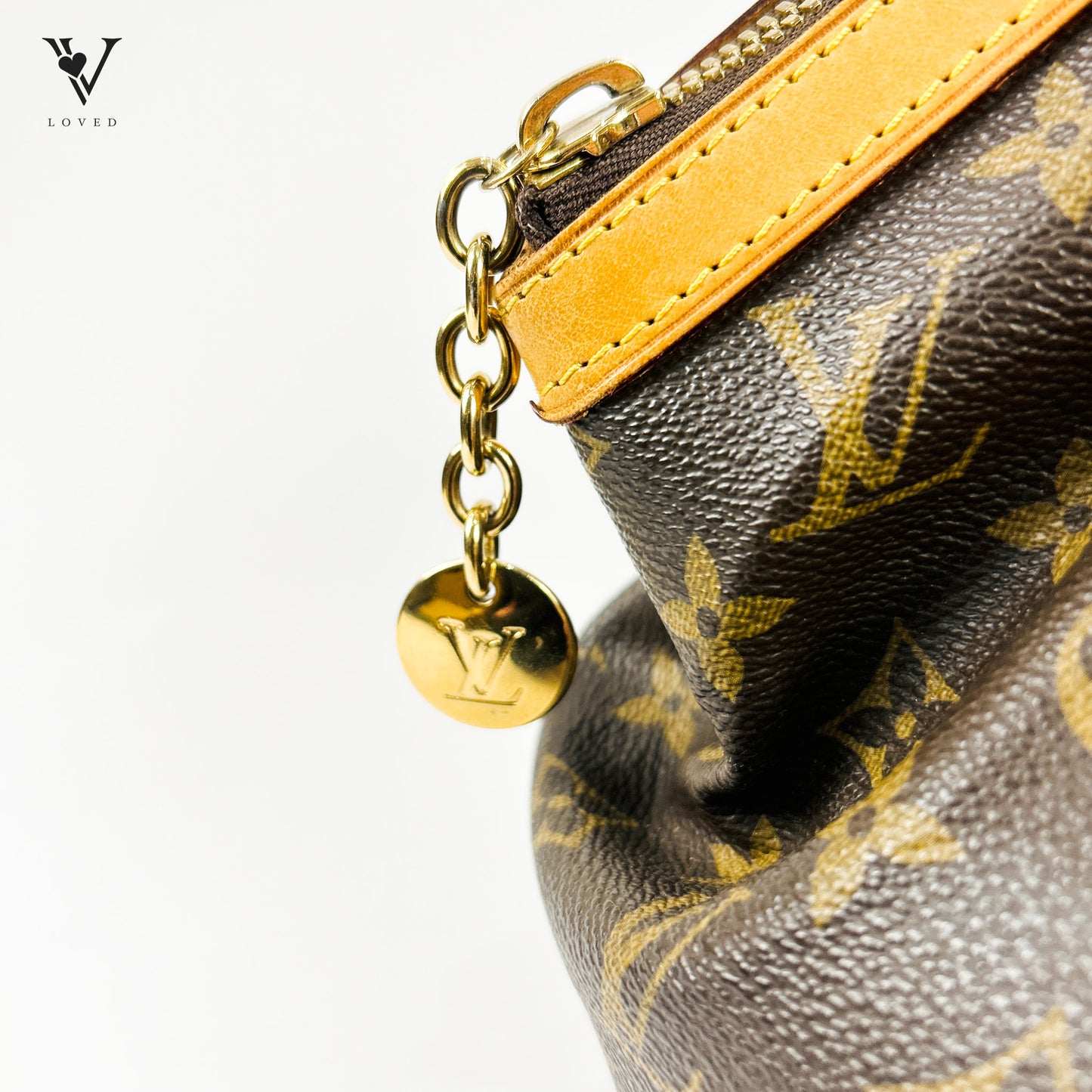 Louis Vuitton Tivoli in Monogram Canvas