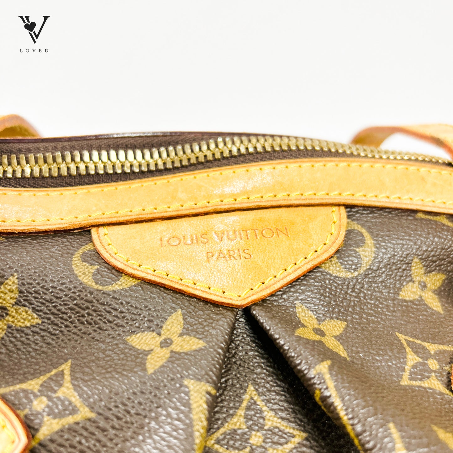 Louis Vuitton Tivoli in Monogram Canvas