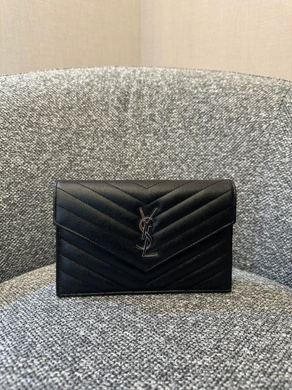 Yves Saint Laurent Cassandre WOC in Quilted Black Leather with Silver Hardware
