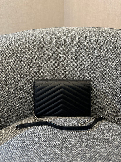 Yves Saint Laurent Cassandre WOC in Quilted Black Leather with Silver Hardware