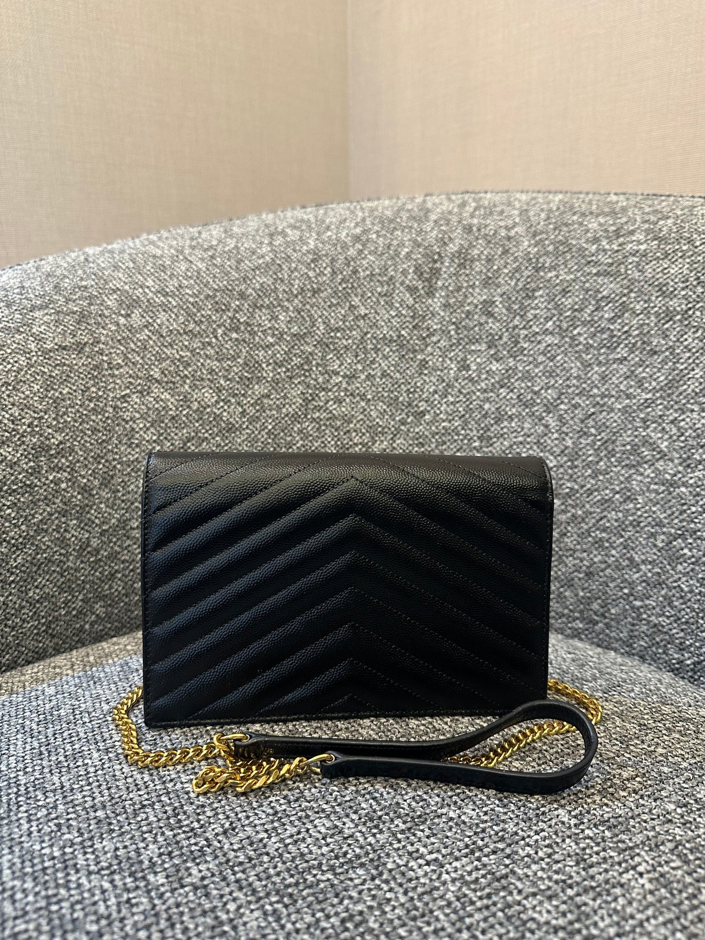 Yves Saint Laurent Cassandre WOC in Quilted Black Leather with Gold Hardware