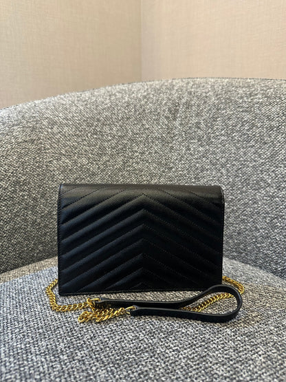 Yves Saint Laurent Cassandre WOC in Quilted Black Leather with Gold Hardware