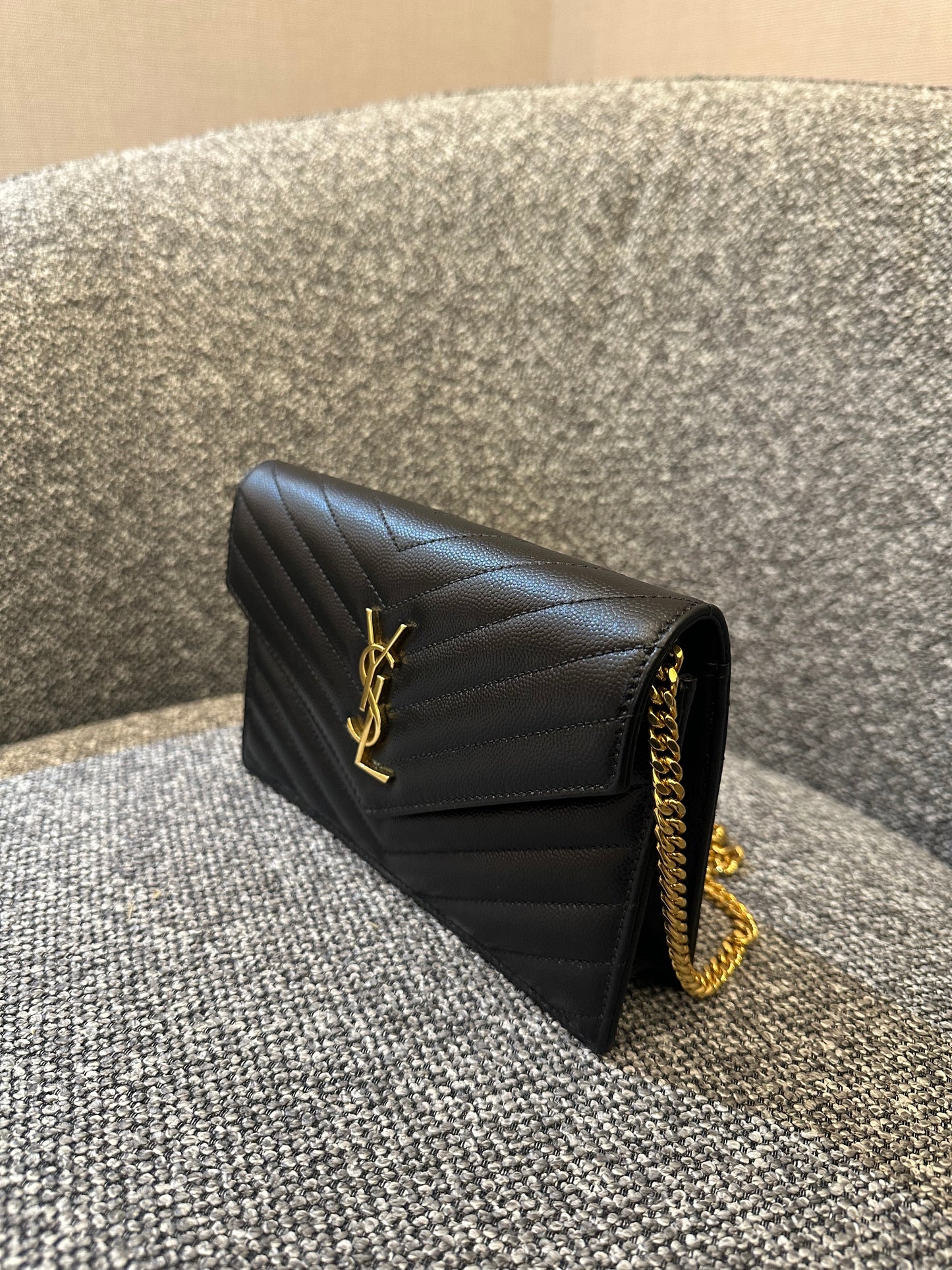 Yves Saint Laurent Cassandre WOC in Quilted Black Leather with Gold Hardware