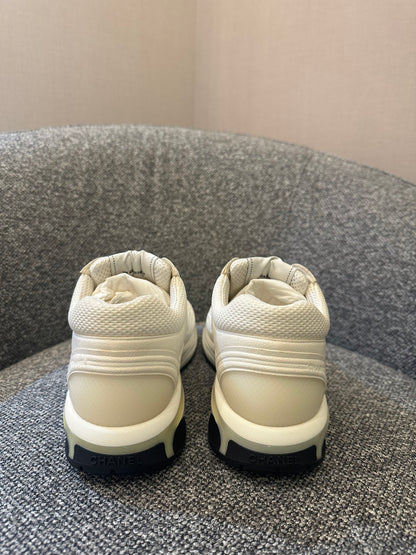 Chanel 24s Sneakers in White Fabric and Leather