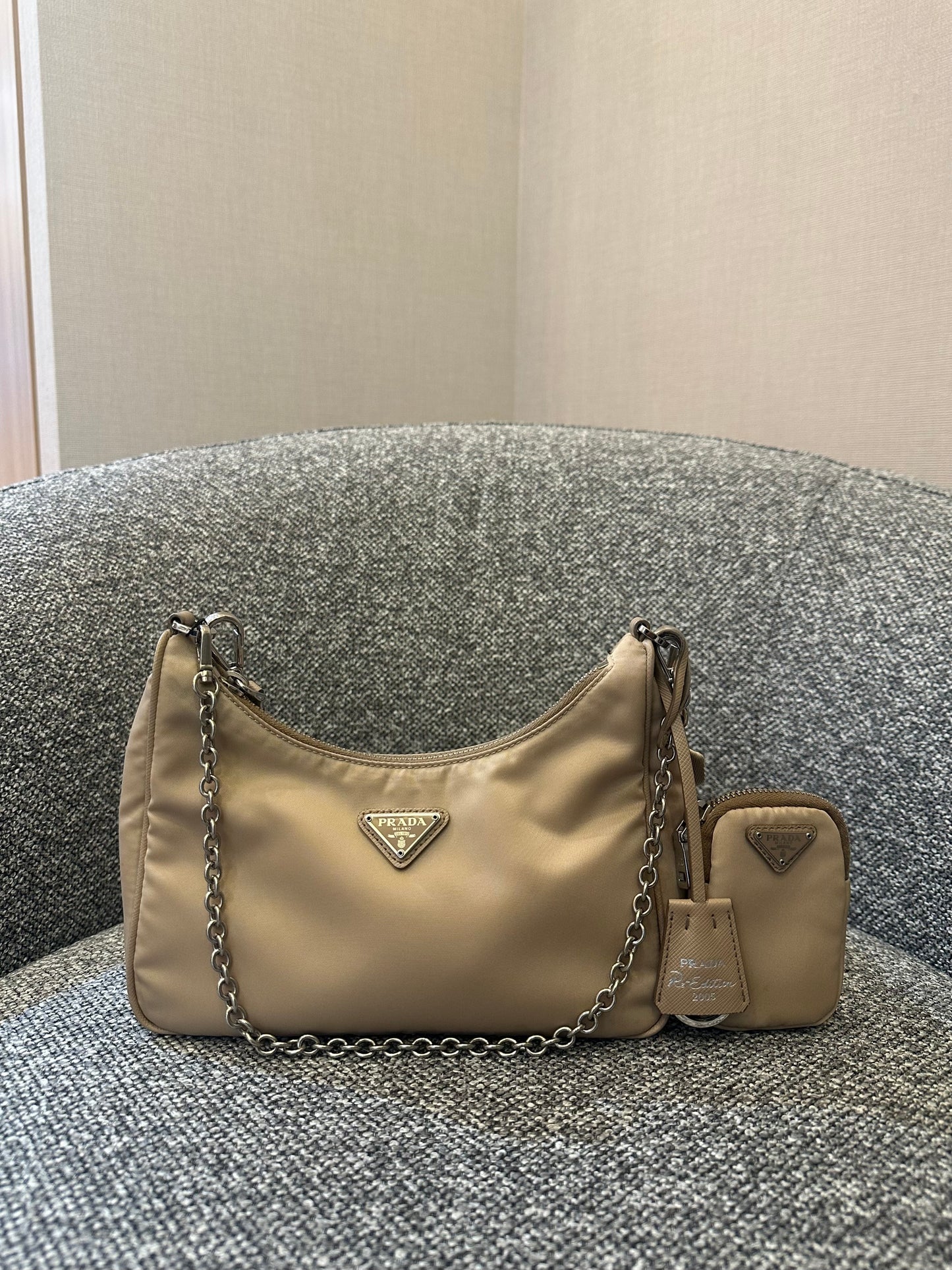 Prada Re-Edition 2005 Mini Hobo Bag in Beige