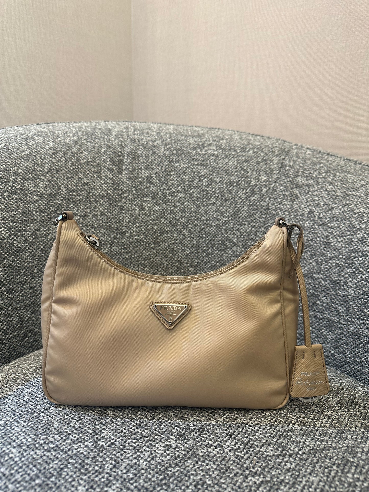 Prada Re-Edition 2005 Mini Hobo Bag in Beige