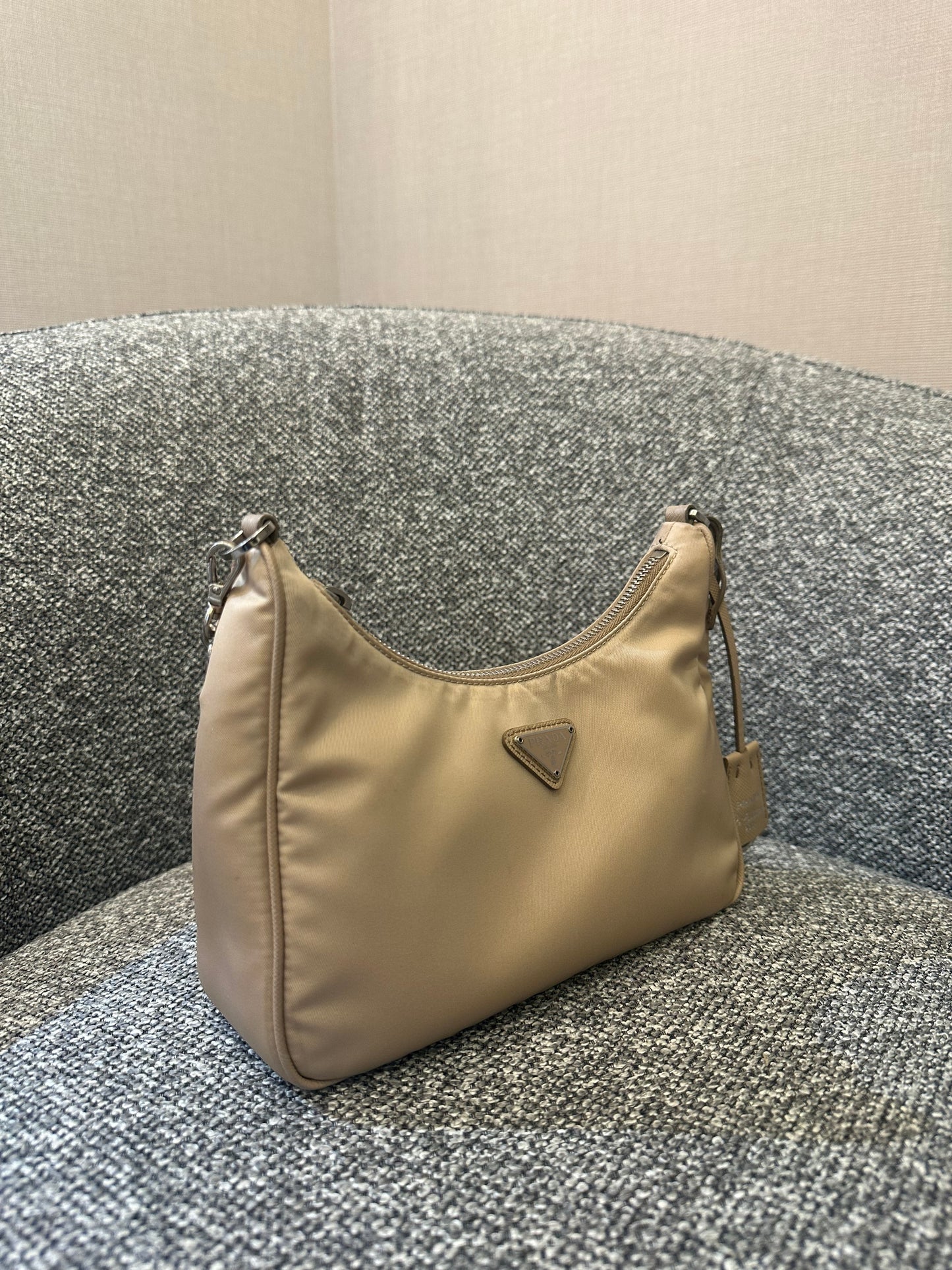 Prada Re-Edition 2005 Mini Hobo Bag in Beige