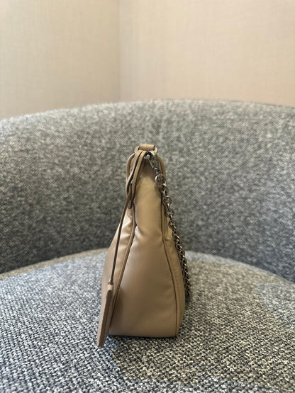 Prada Re-Edition 2005 Mini Hobo Bag in Beige