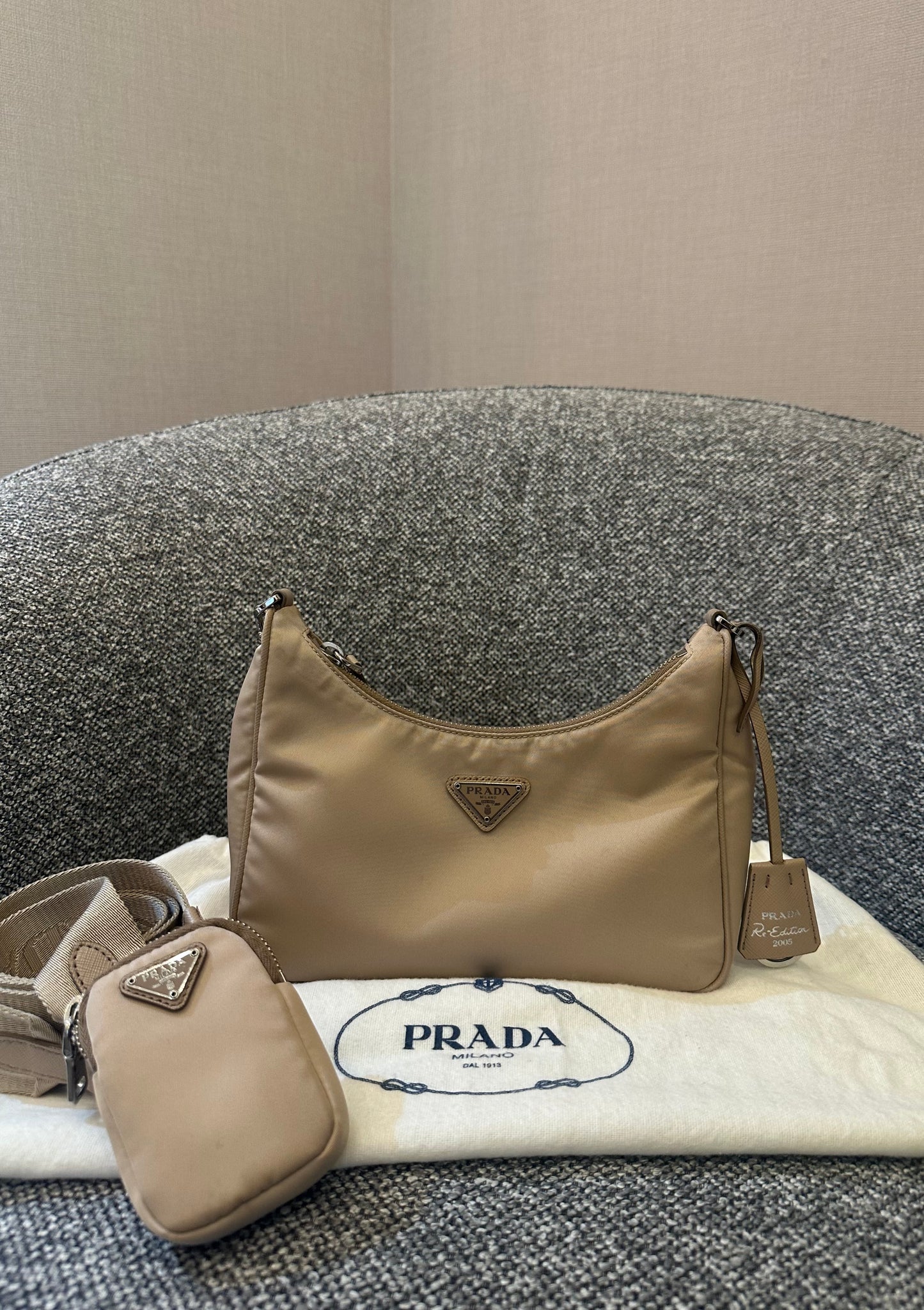 Prada Re-Edition 2005 Mini Hobo Bag in Beige