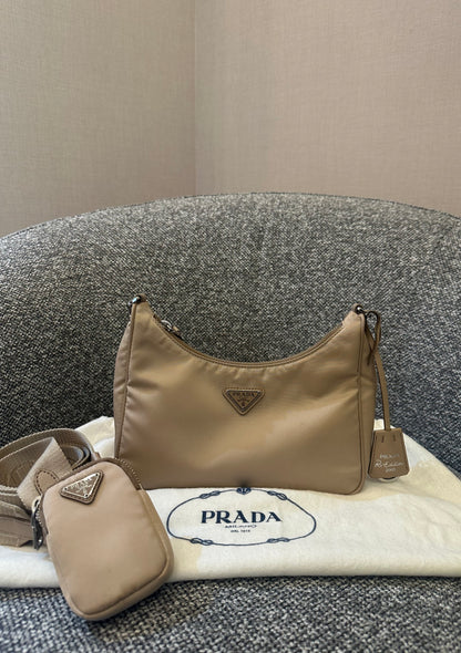Prada Re-Edition 2005 Mini Hobo Bag in Beige