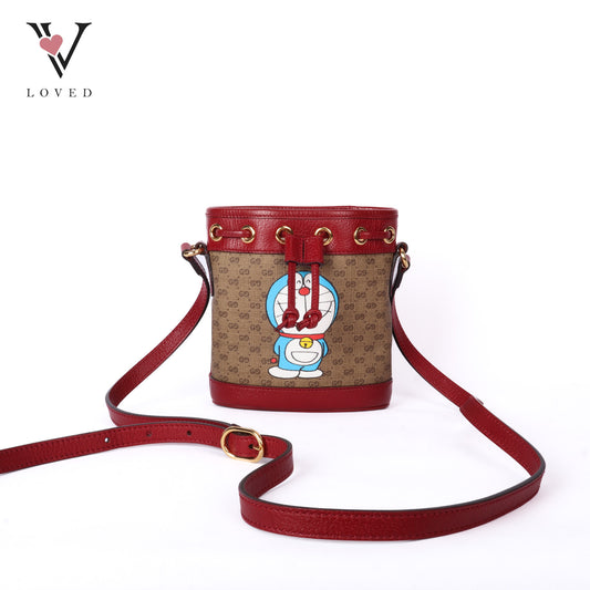 Gucci x Doraemon Bucket Bag Mini in Ebony and Beige