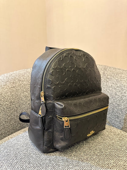Coach Charlie Backpack in Black Signature Embossed Leather