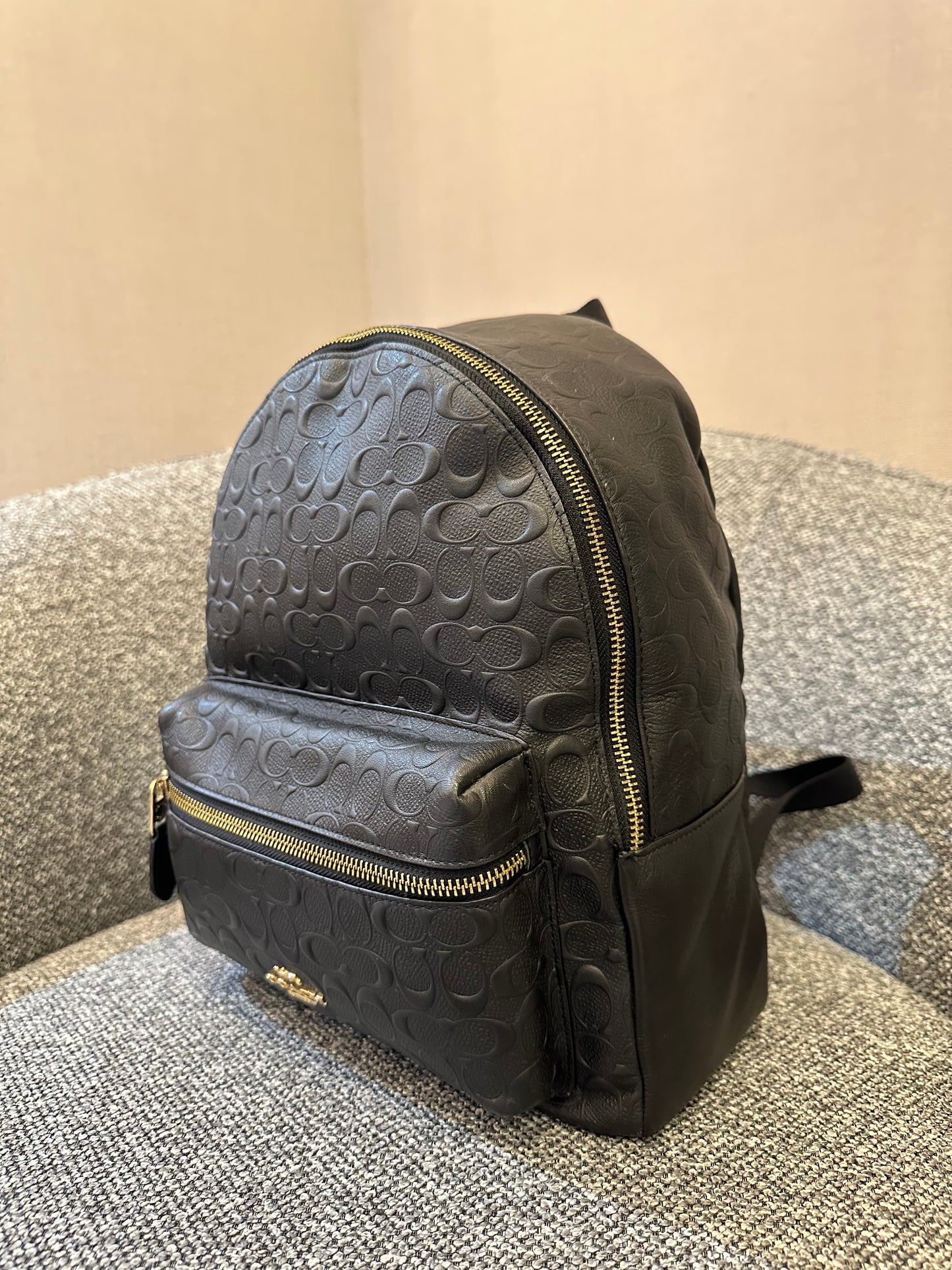 Coach Charlie Backpack in Black Signature Embossed Leather