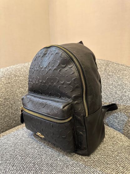 Coach Charlie Backpack in Black Signature Embossed Leather