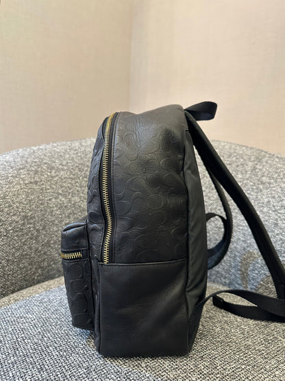Coach Charlie Backpack in Black Signature Embossed Leather
