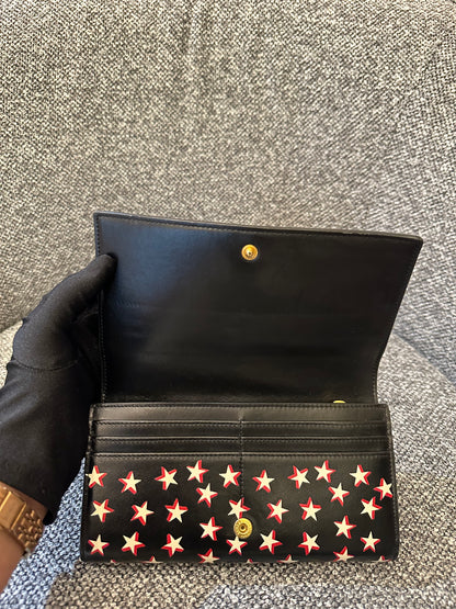 Yves Saint Laurent Star Print Folding Wallet in Black Leather