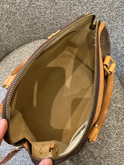Louis Vuitton Retiro PM Bag In Monogram Canvas