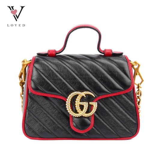 Gucci GG Marmont Flap Handbag In Black Quilted Chevron Leather