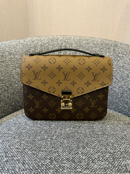 Louis Vuitton Metis Bag in Reverse Monogram Canvas