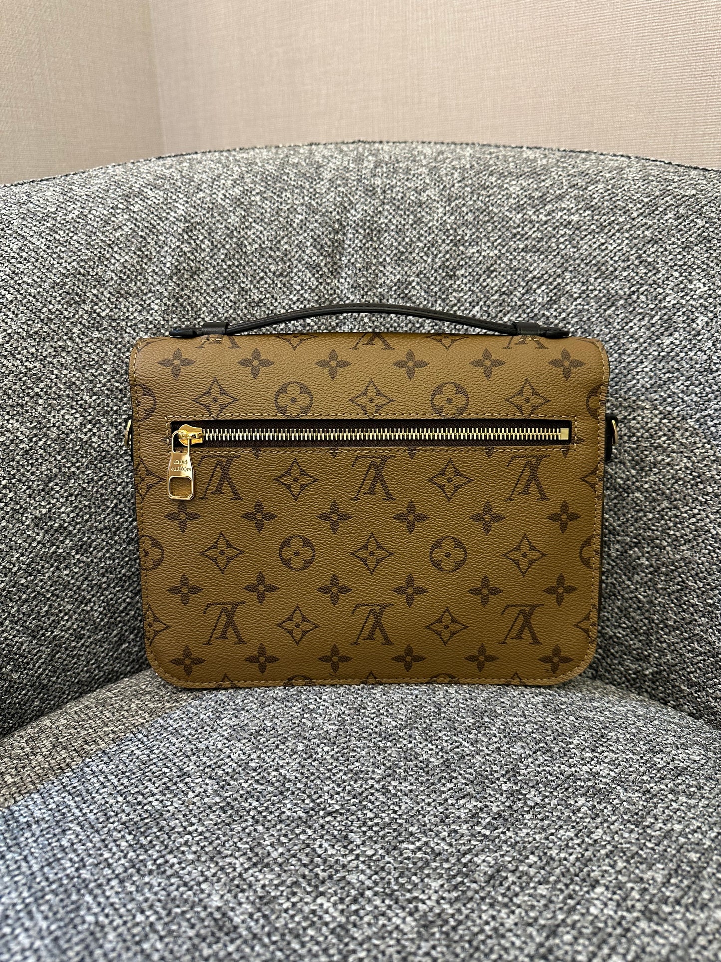 Louis Vuitton Metis Bag in Reverse Monogram Canvas
