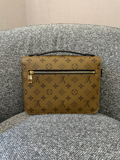 Louis Vuitton Metis Bag in Reverse Monogram Canvas
