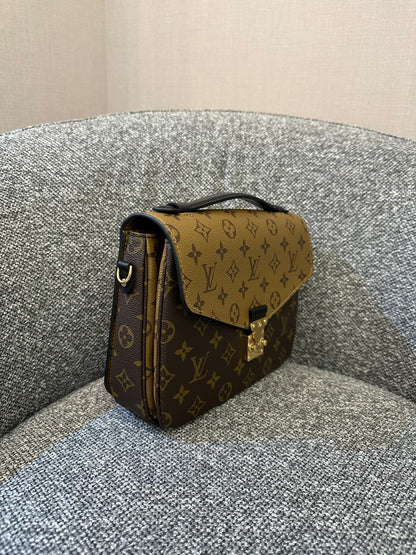 Louis Vuitton Metis Bag in Reverse Monogram Canvas