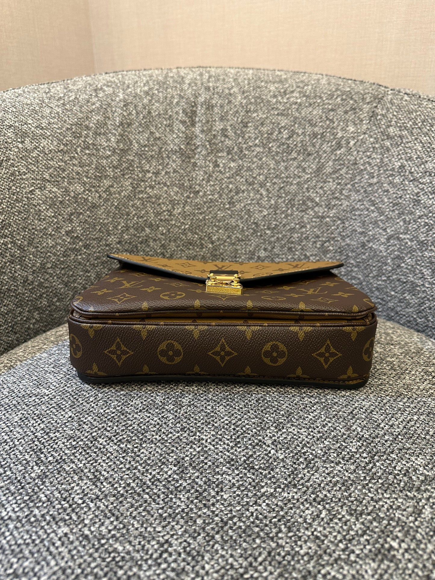 Louis Vuitton Metis Bag in Reverse Monogram Canvas