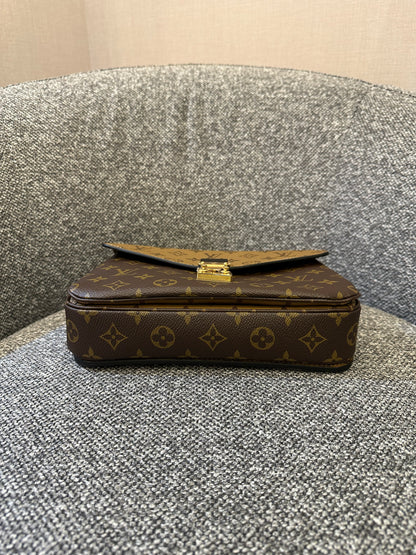 Louis Vuitton Metis Bag in Reverse Monogram Canvas