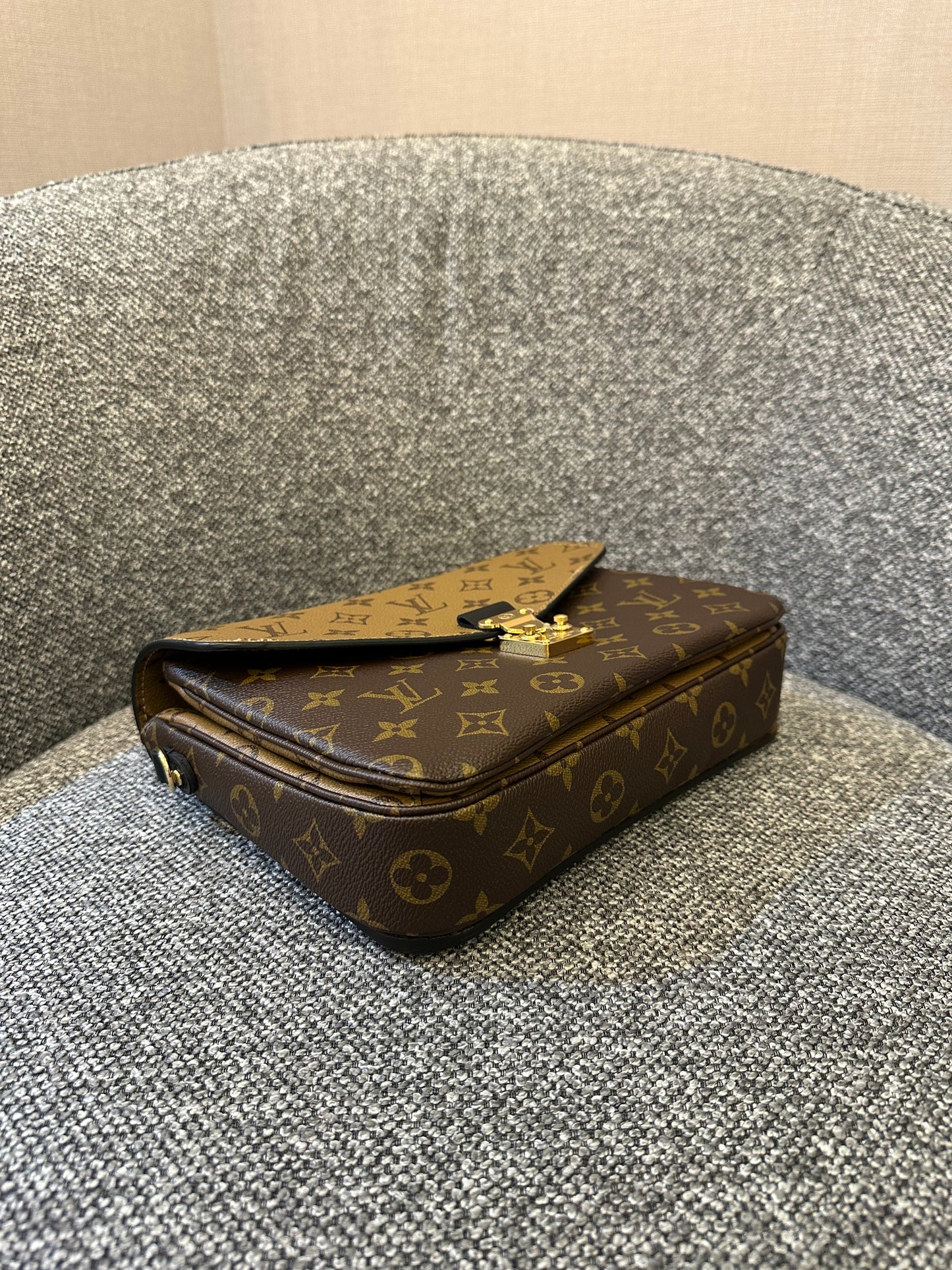 Louis Vuitton Metis Bag in Reverse Monogram Canvas